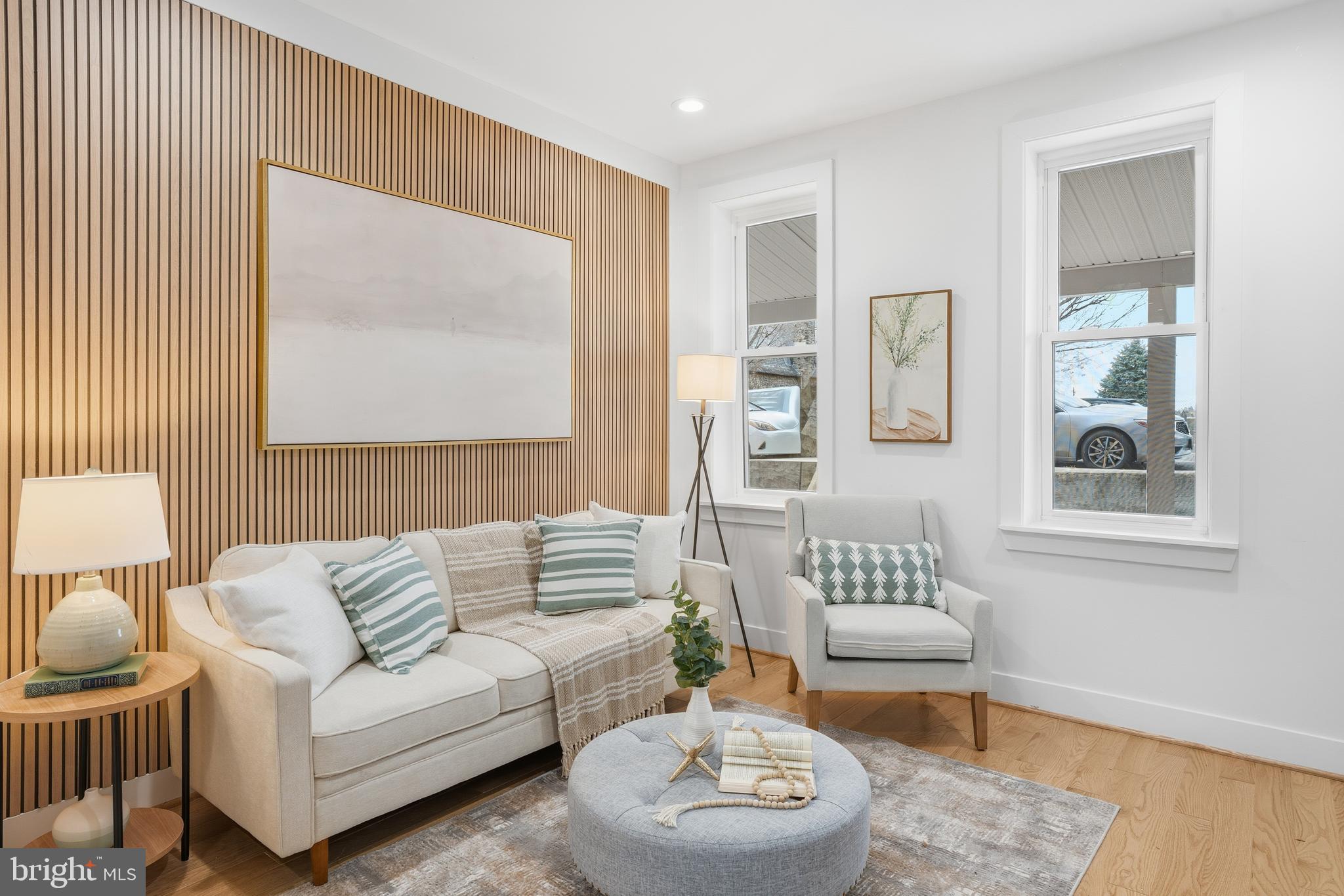 3923 Roland Avenue Baltimore, MD 21211 - Photo 10 of 30 a living room with furniture and a potted plant