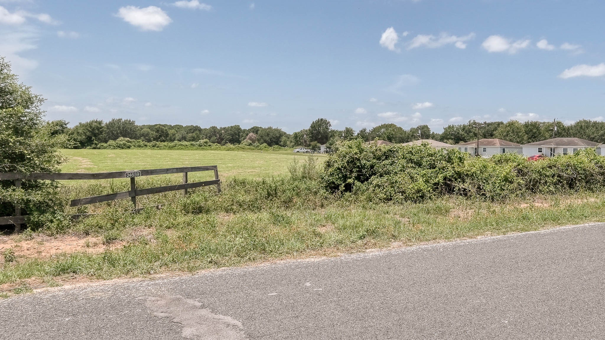 24659 Richards Road Hempstead, TX 77445 - Photo 14 of 15 a view of lake with green space
