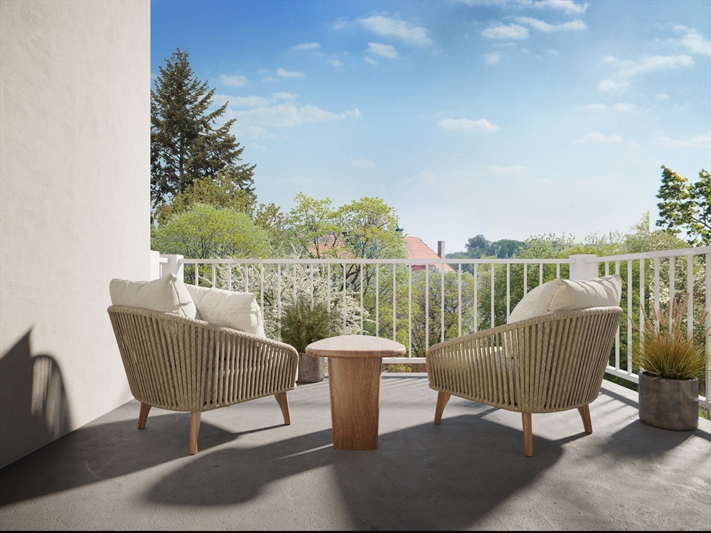 16 Stearns Road, Unit 103 Wellesley, MA 02482 - Photo 6 of 6 a view of a chair and table on the terrace