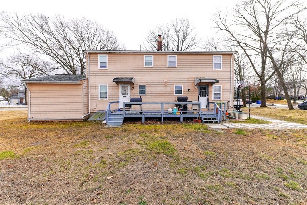 22 Clark Street Randolph, MA 02368 - Photo 3 of 26 a view of a house with a patio