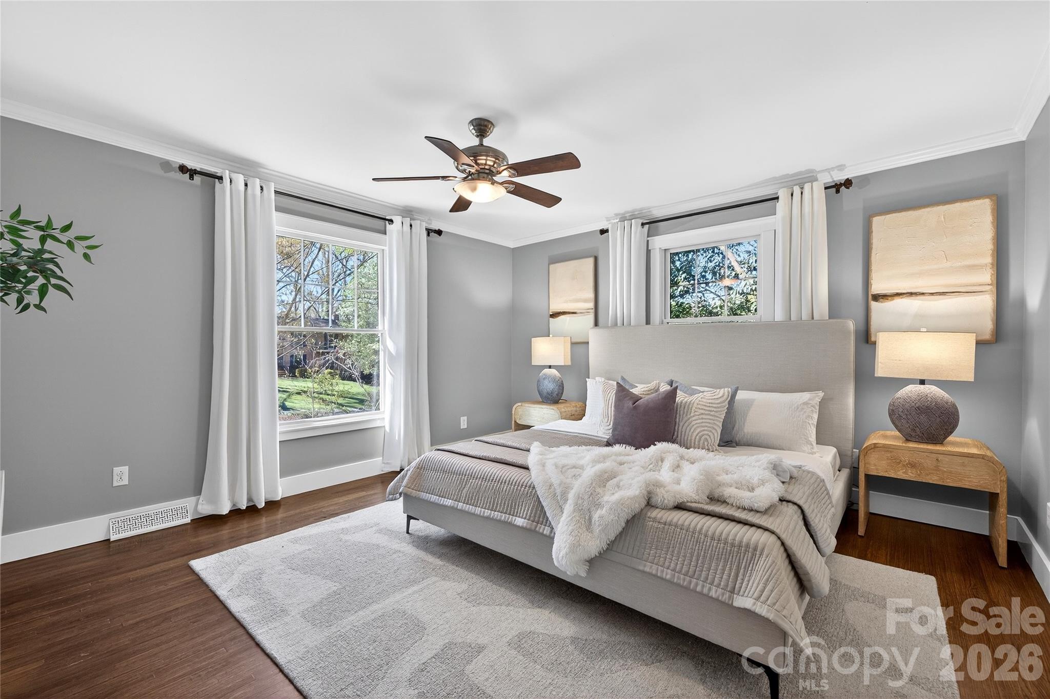 3717 Riverbend Road Charlotte, NC 28210 - Photo 17 of 41 a bedroom with a bed and wooden floor