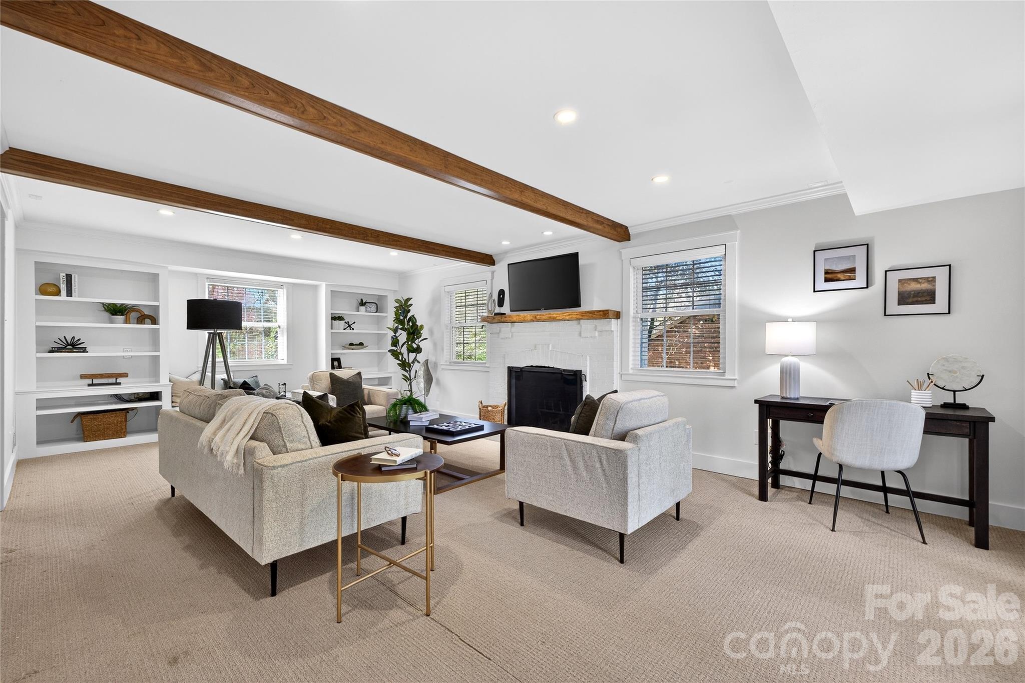 3717 Riverbend Road Charlotte, NC 28210 - Photo 24 of 41 a living room with furniture and a fireplace