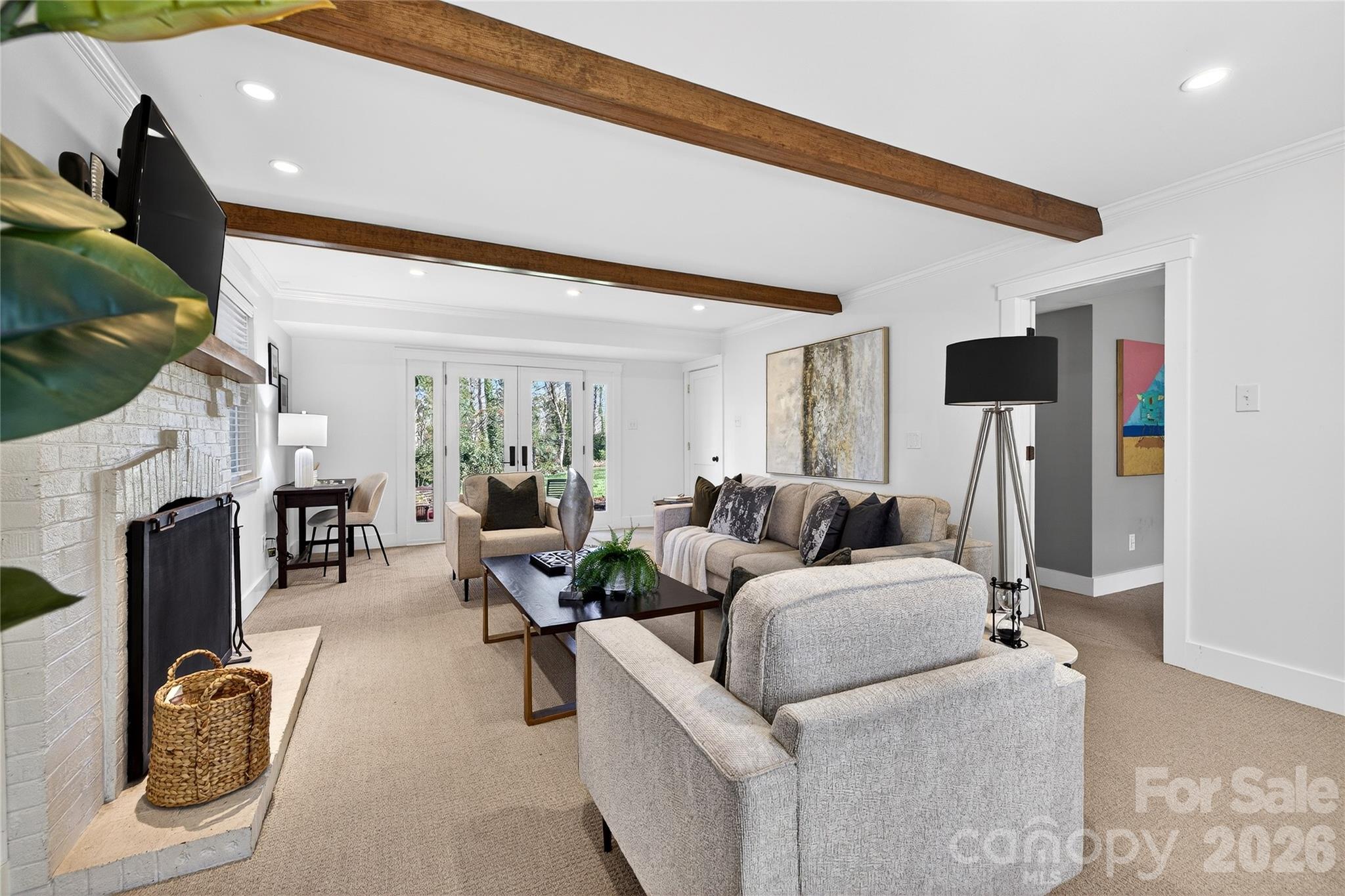 3717 Riverbend Road Charlotte, NC 28210 - Photo 25 of 41 a living room with fireplace furniture and a flat screen tv