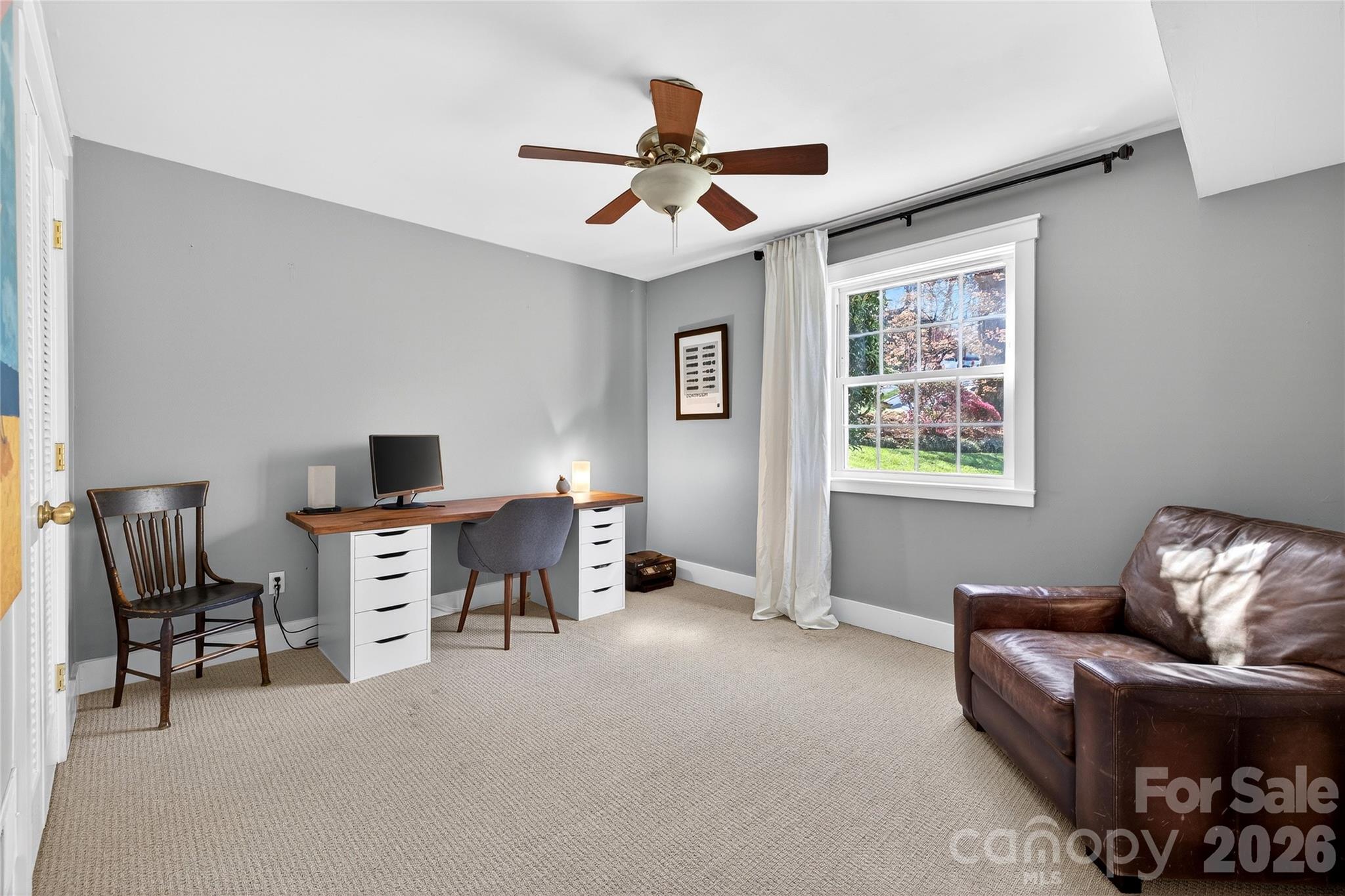 3717 Riverbend Road Charlotte, NC 28210 - Photo 28 of 41 a living room with furniture and a window
