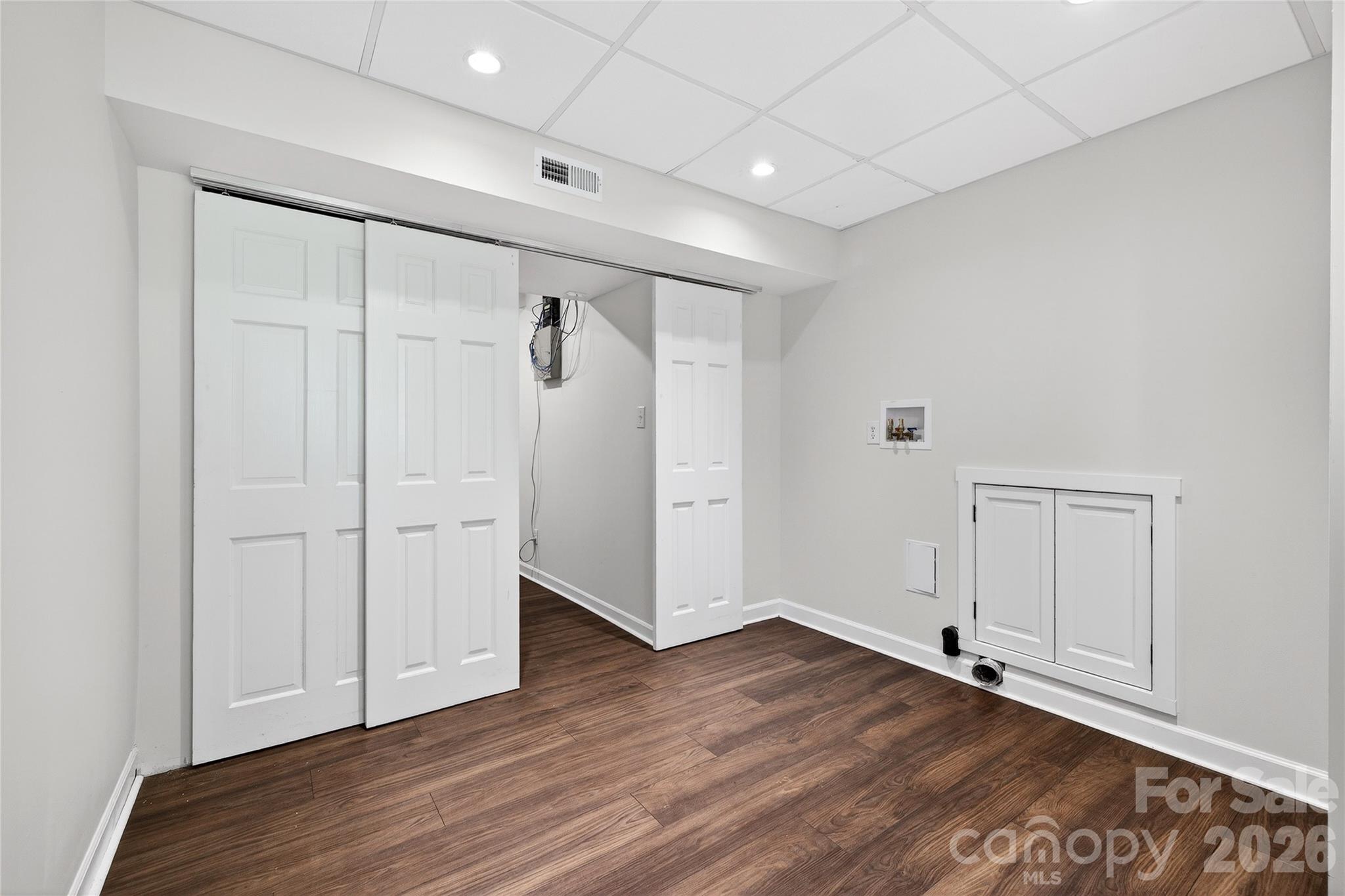 3717 Riverbend Road Charlotte, NC 28210 - Photo 30 of 41 a view of an empty room with wooden floor