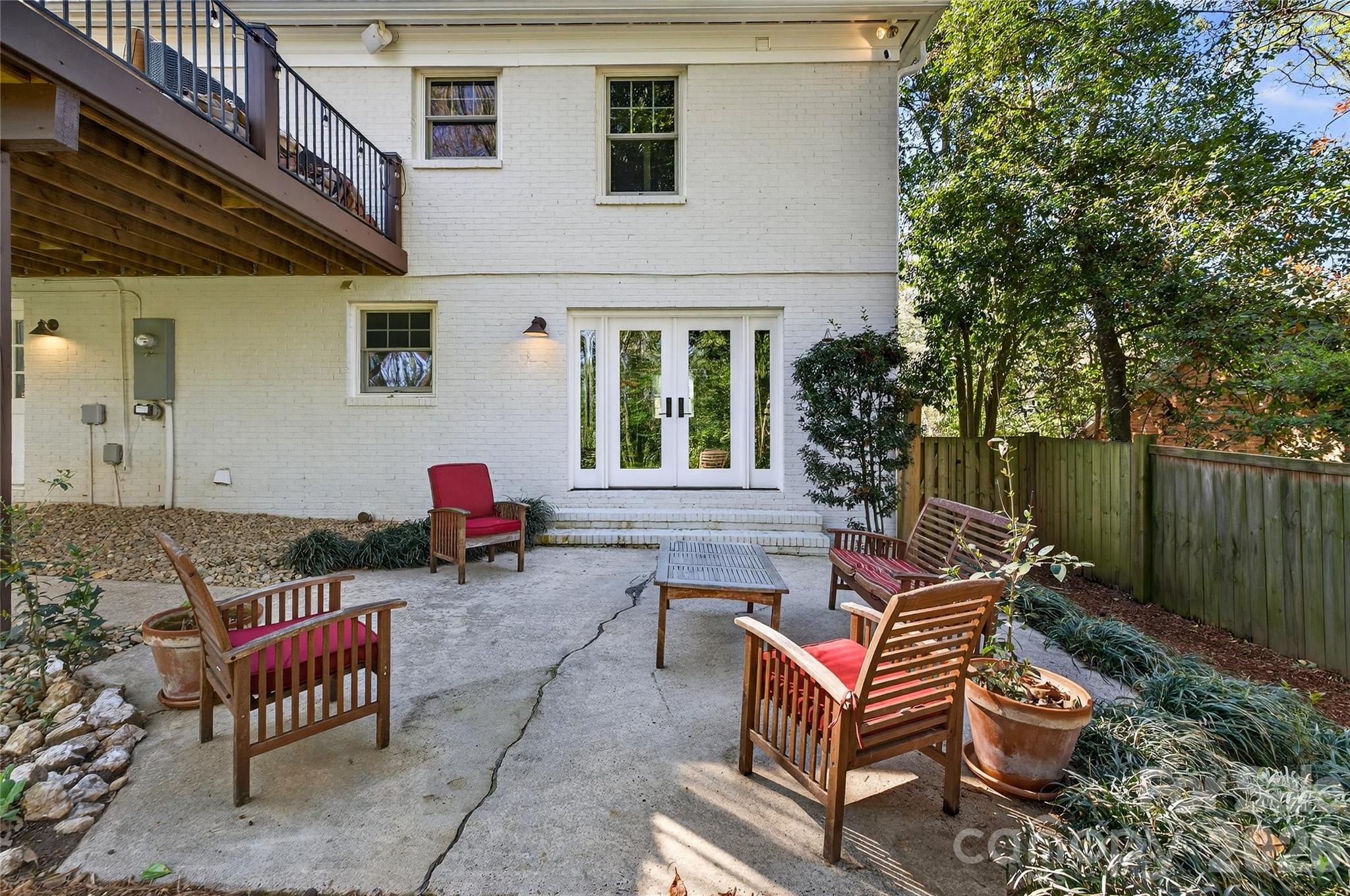 3717 Riverbend Road Charlotte, NC 28210 - Photo 35 of 41 a backyard of a house with outdoor seating