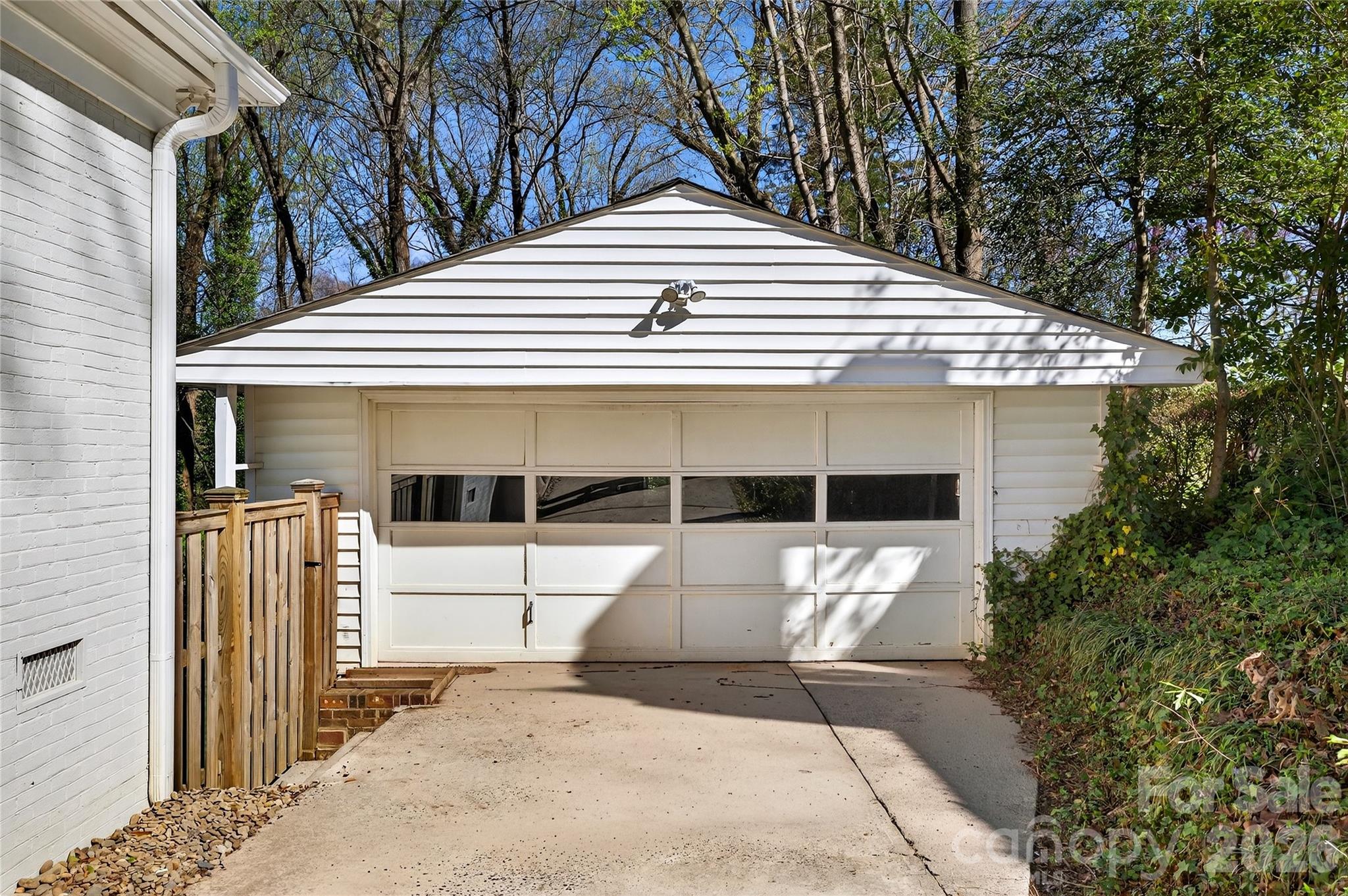 3717 Riverbend Road Charlotte, NC 28210 - Photo 38 of 41 a front view of a house with a garage
