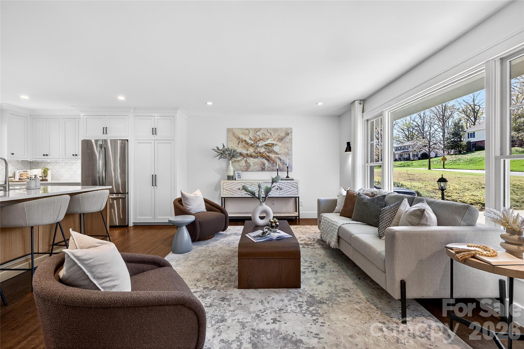 3717 Riverbend Road Charlotte, NC 28210 - Photo 7 of 41 a living room with furniture and a large window