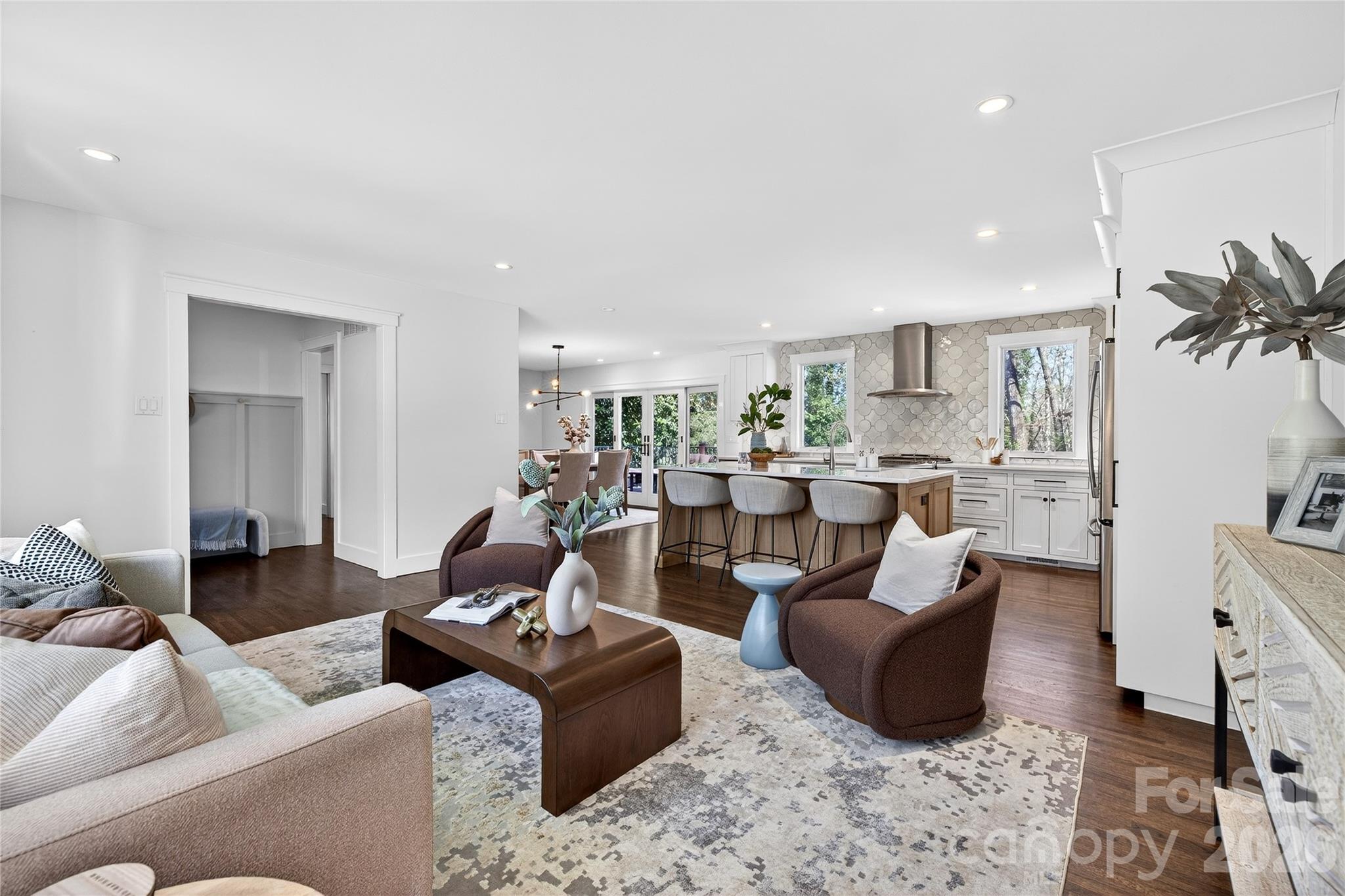 3717 Riverbend Road Charlotte, NC 28210 - Photo 9 of 41 a living room with furniture and a view of kitchen