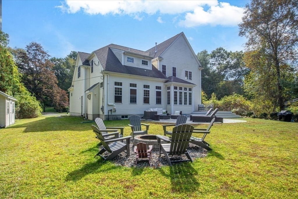 55 Cross Street Foxboro, MA 02035 - Photo 6 of 7 a view of a house with swimming pool and sitting area