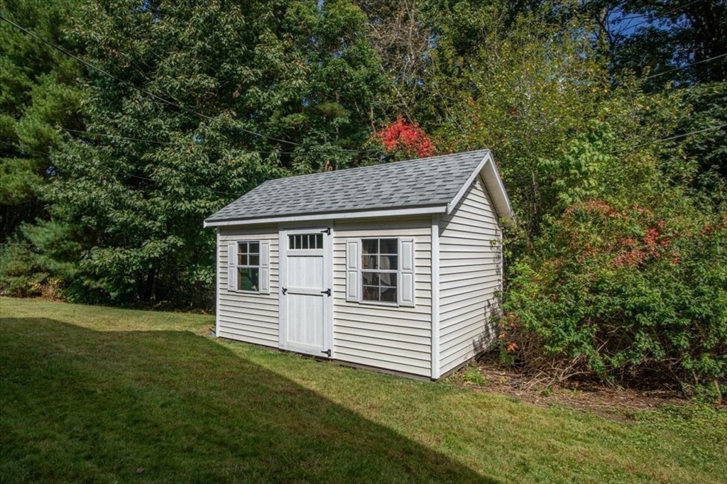 55 Cross Street Foxboro, MA 02035 - Photo 7 of 7 a view of a house with a yard