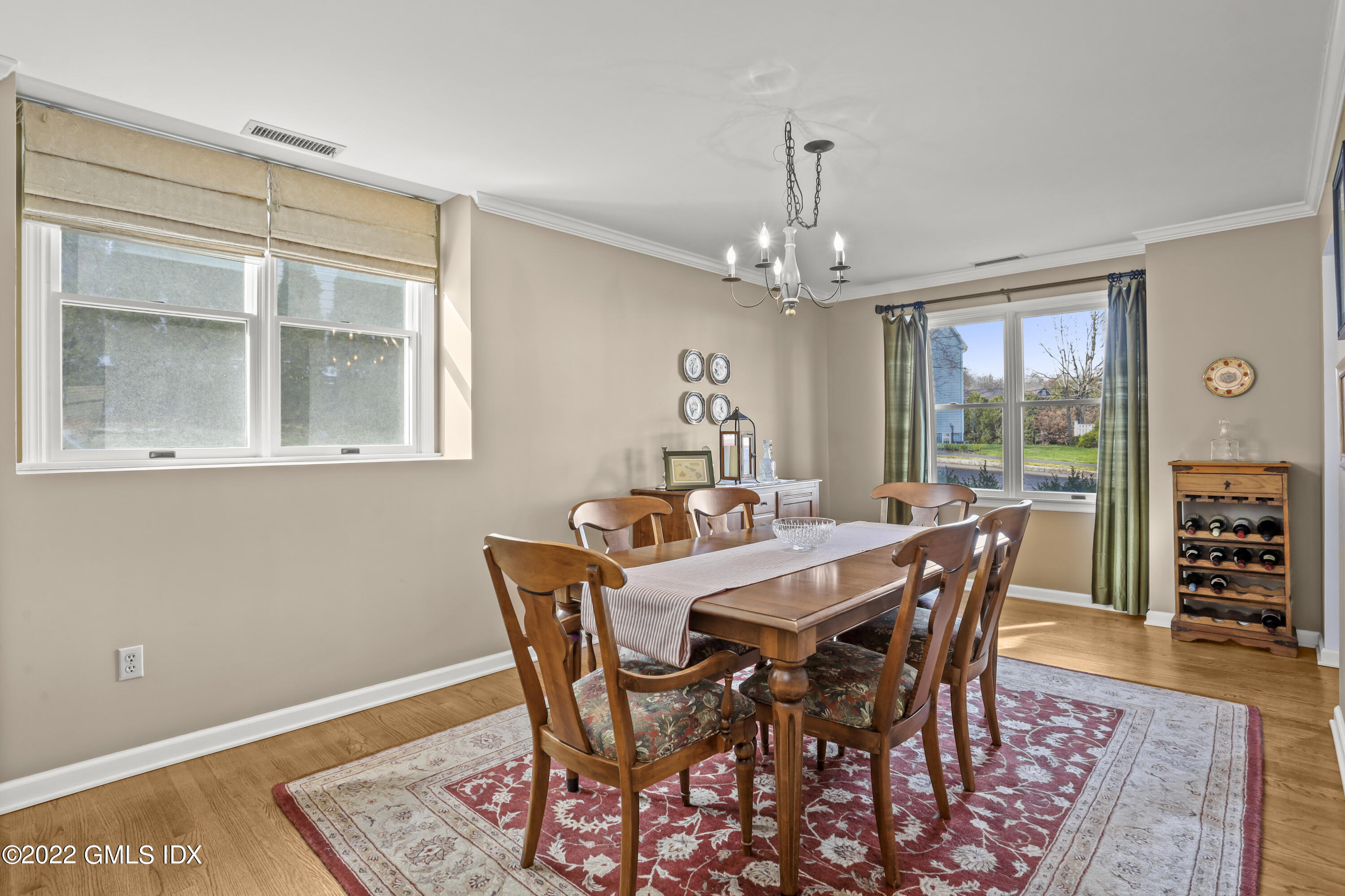 24 Sunshine Avenue Riverside, CT 06878 - Photo 14 of 44 a view of a dining room with furniture window and outside view