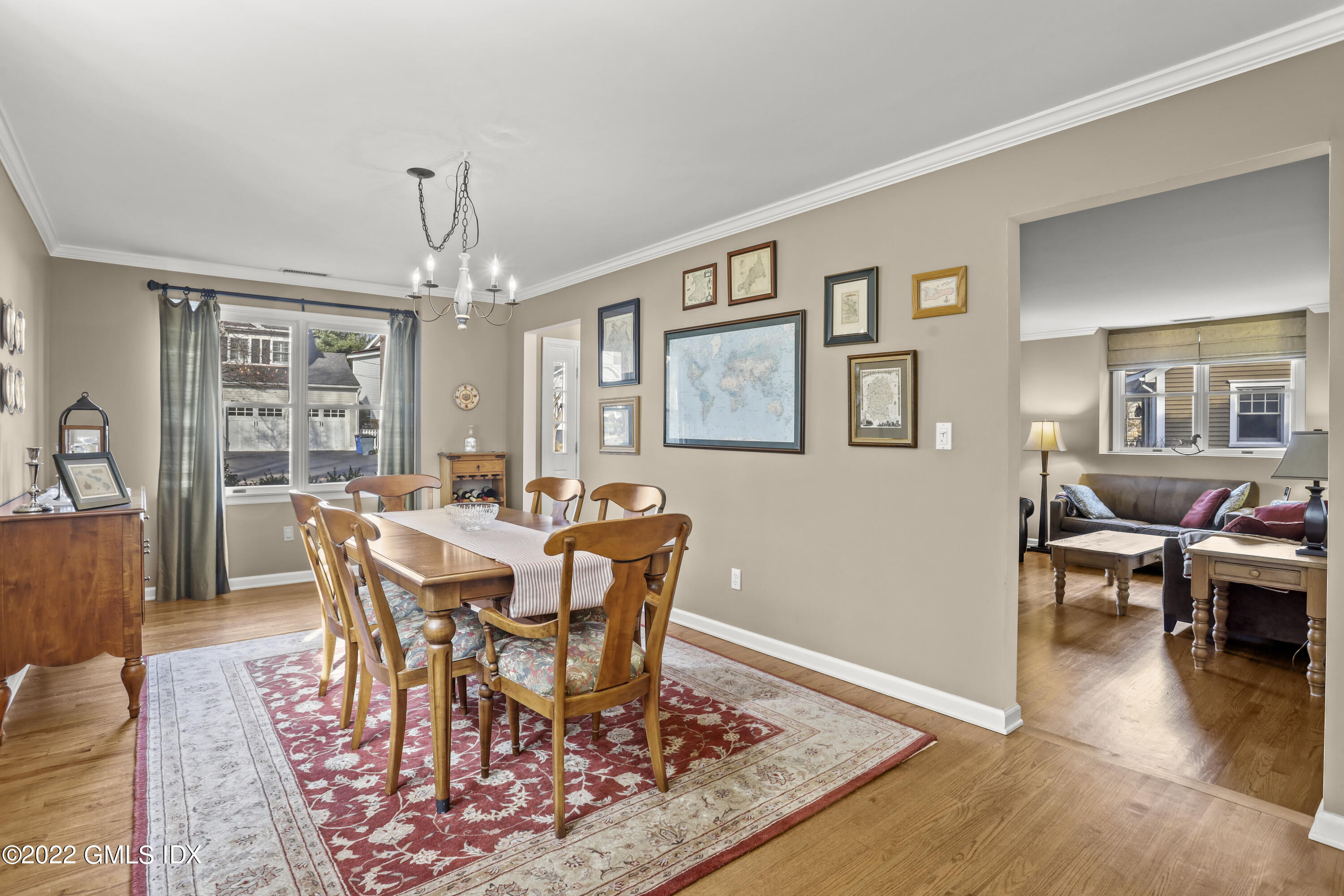 24 Sunshine Avenue Riverside, CT 06878 - Photo 15 of 44 a view of a dining room with furniture window and wooden floor
