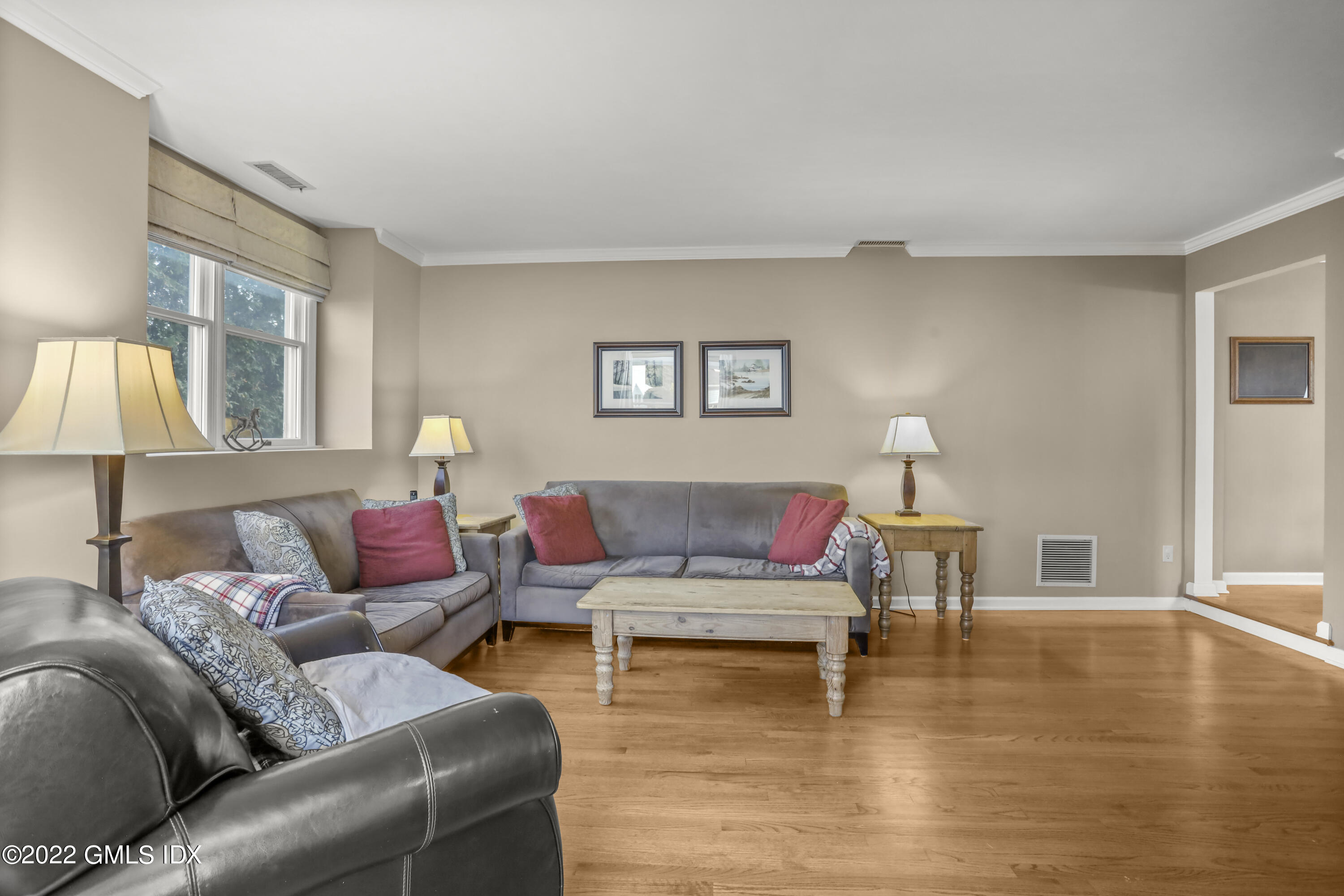 24 Sunshine Avenue Riverside, CT 06878 - Photo 17 of 44 a living room with furniture and a lamp