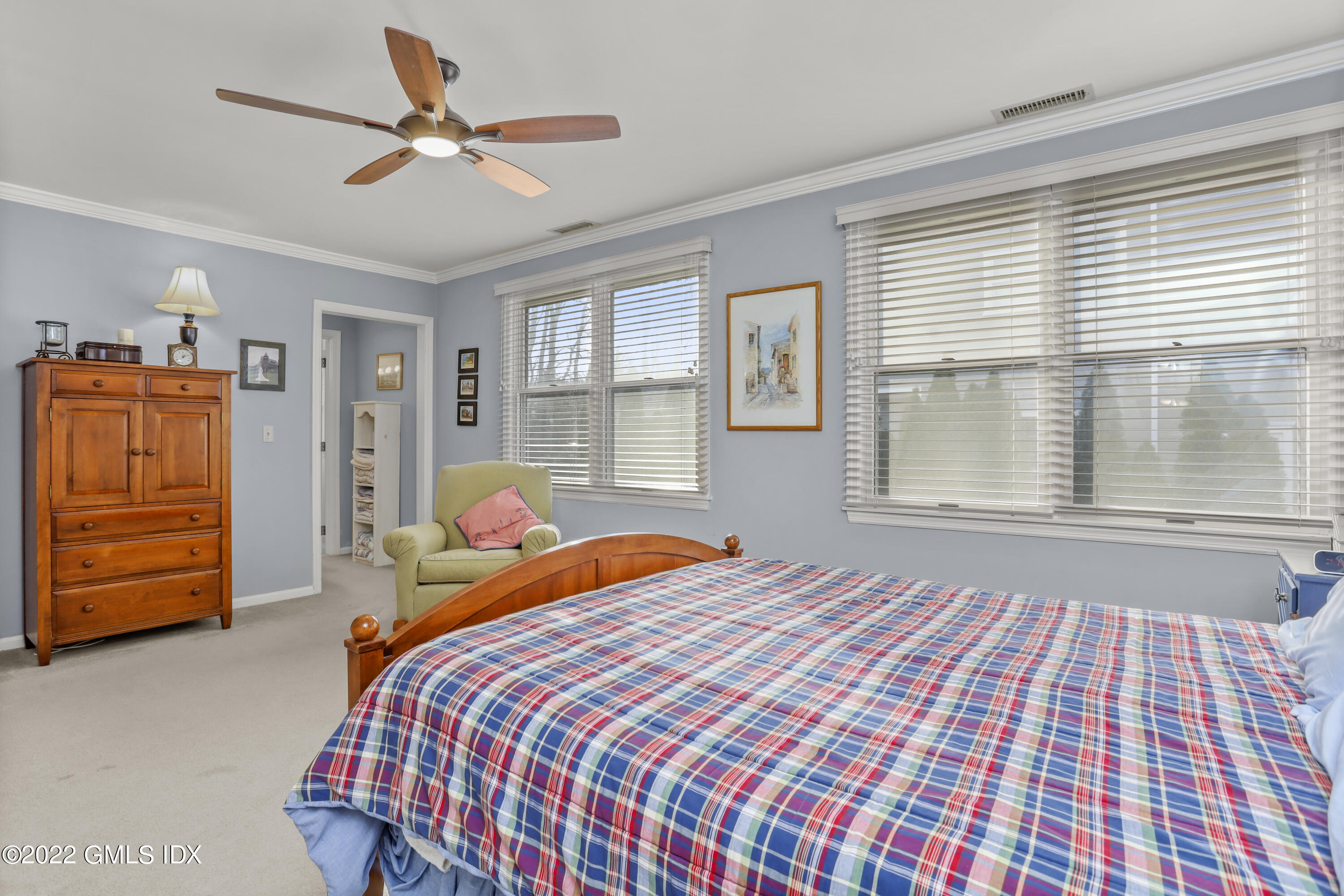 24 Sunshine Avenue Riverside, CT 06878 - Photo 28 of 44 a bedroom with a bed and a walk in closet