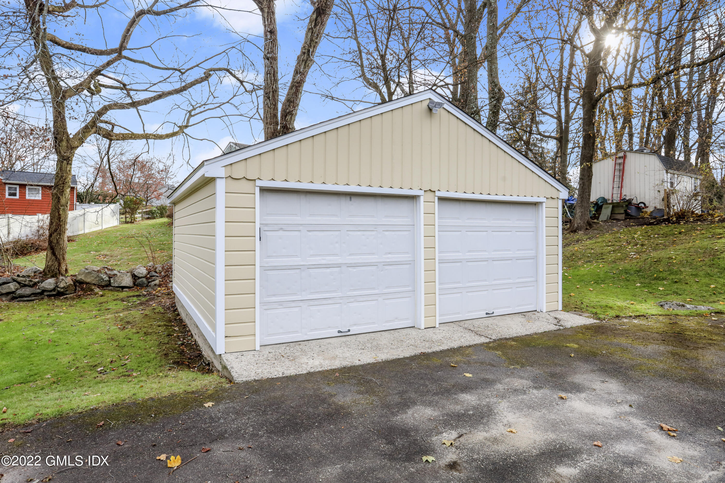 24 Sunshine Avenue Riverside, CT 06878 - Photo 5 of 44 a house with a yard and garage