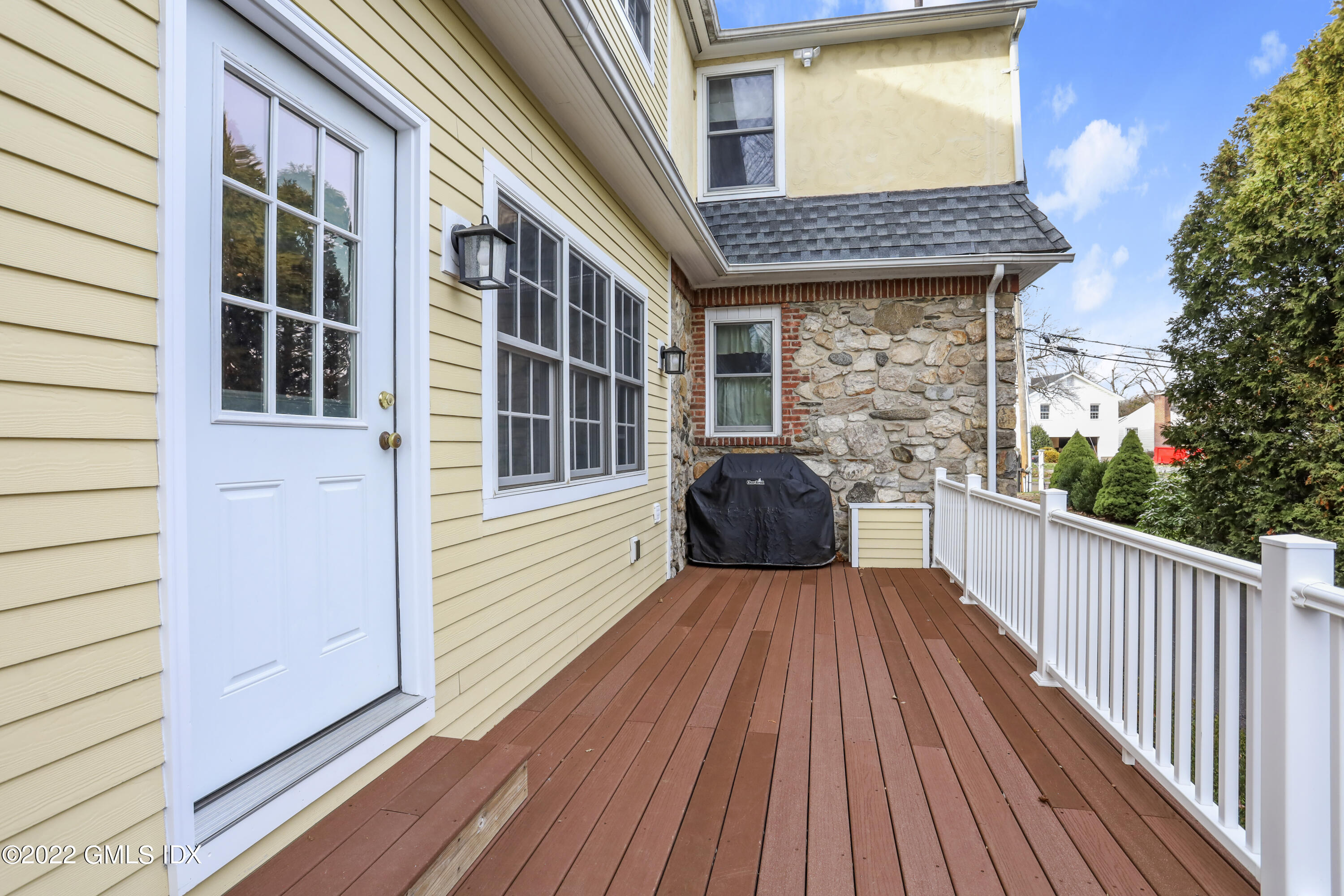 24 Sunshine Avenue Riverside, CT 06878 - Photo 7 of 44 a view of a brick house with a large window