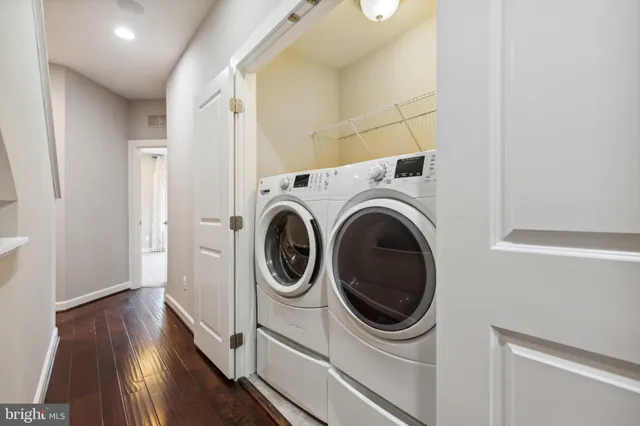 a utility room with dryer and washer