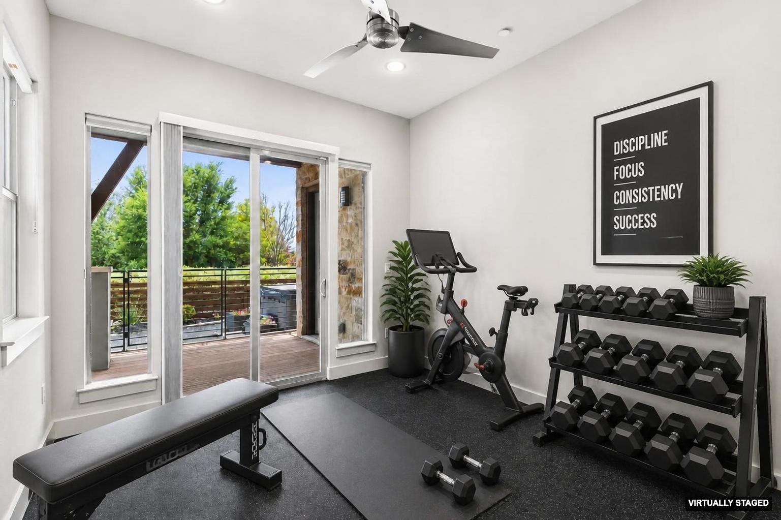 8110 Ranch Road 2222, Unit 68 Austin, TX 78730 - Photo 11 of 24 An ideal home gym space, featuring direct access to a private outdoor deck.