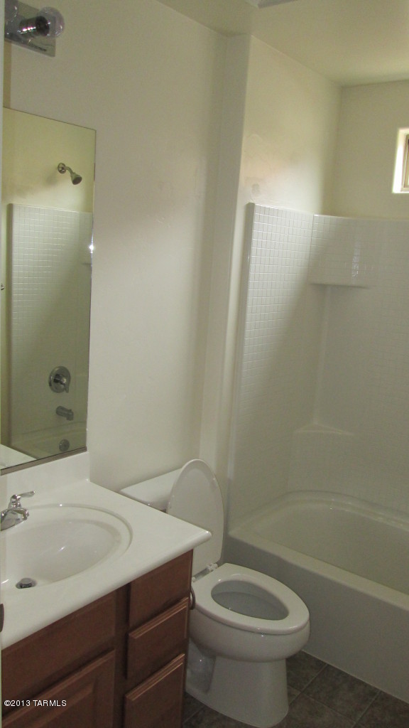 10855 East New Rock Ridge Drive Vail, AZ 85641 - Photo 21 of 34 a bathroom with a sink and a toilet
