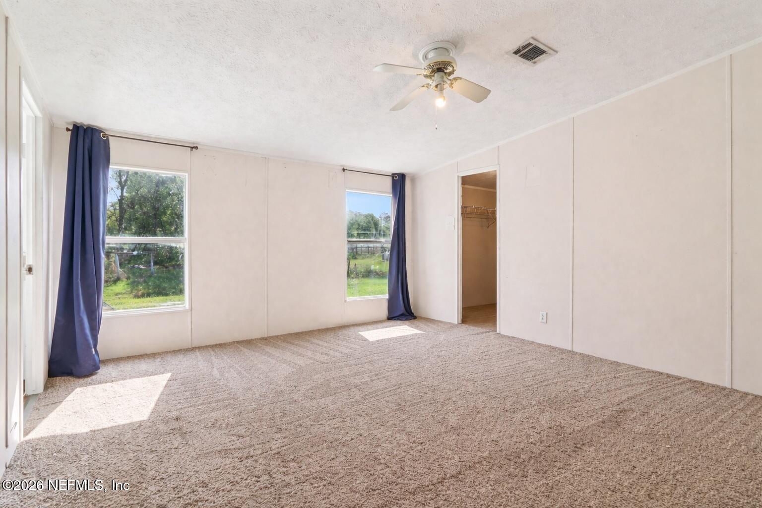 14070 John Williams Road Sanderson, FL 32087 - Photo 9 of 25 empty_master_bedroom