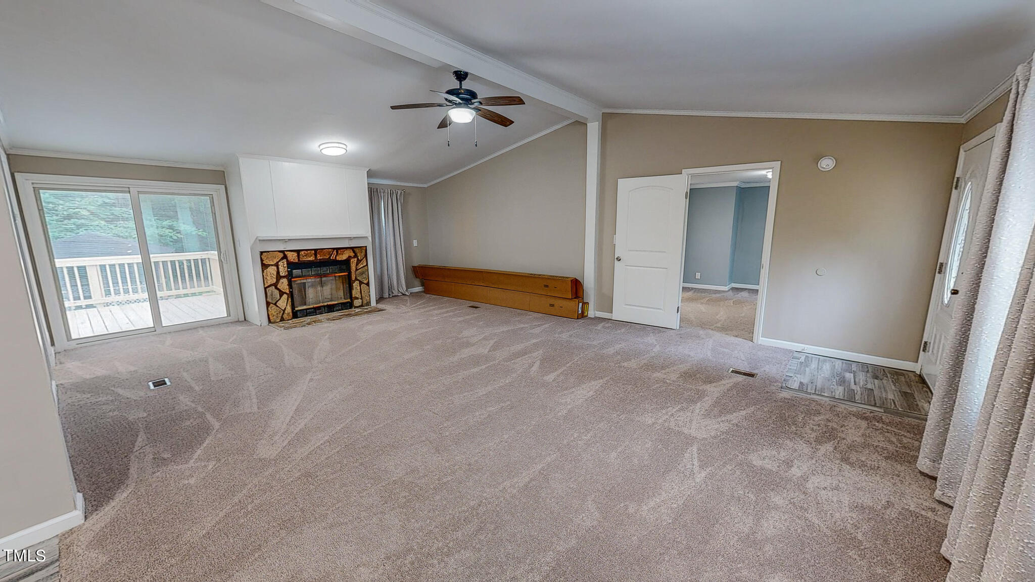 58 Gatewood Road Timberlake, NC 27583 - Photo 17 of 33 a view of an empty room with a fireplace