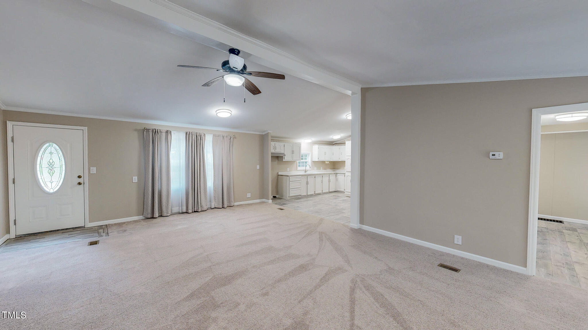 58 Gatewood Road Timberlake, NC 27583 - Photo 3 of 33 a view of an empty room with a window