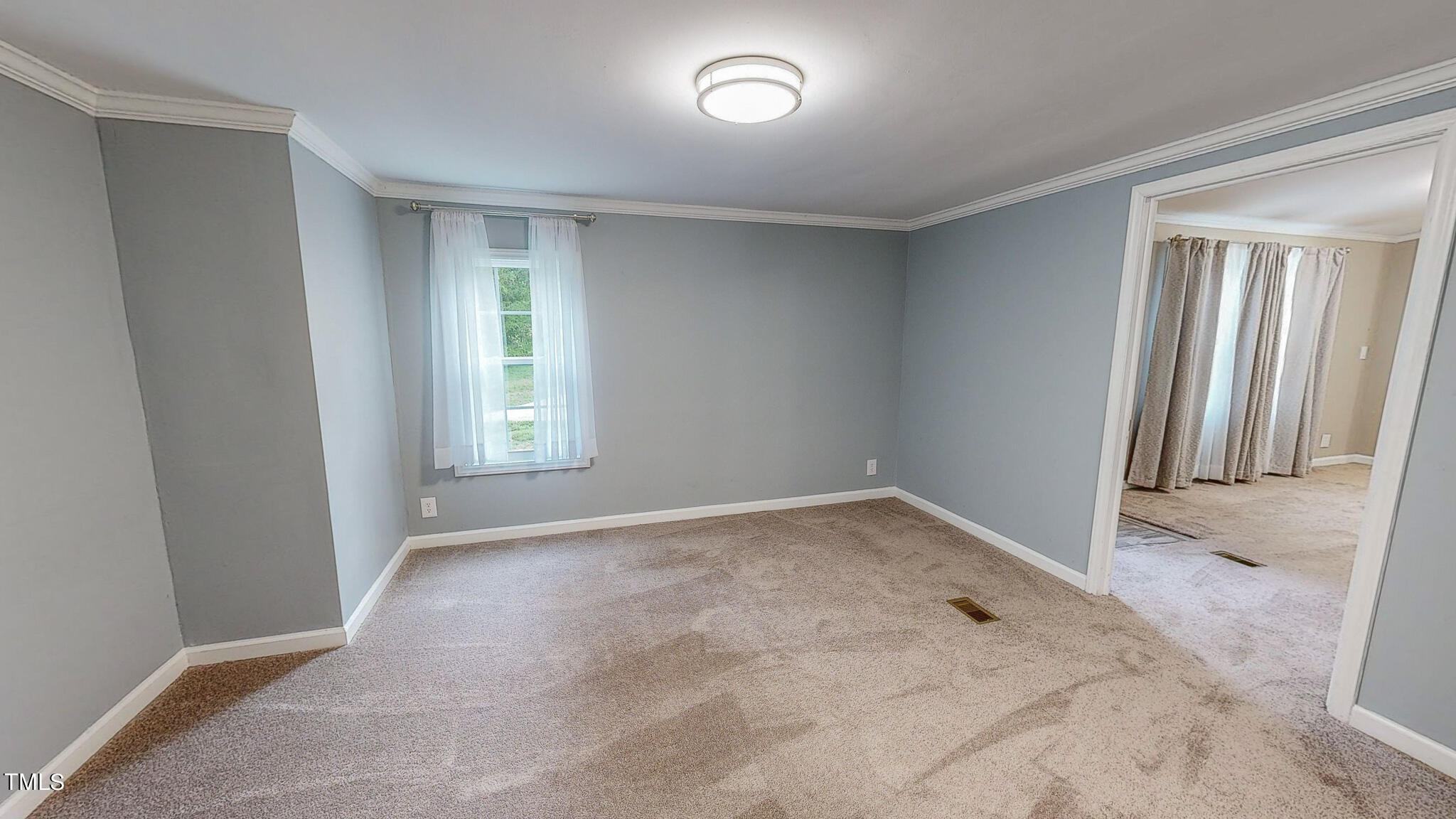 58 Gatewood Road Timberlake, NC 27583 - Photo 8 of 33 an empty room with a window