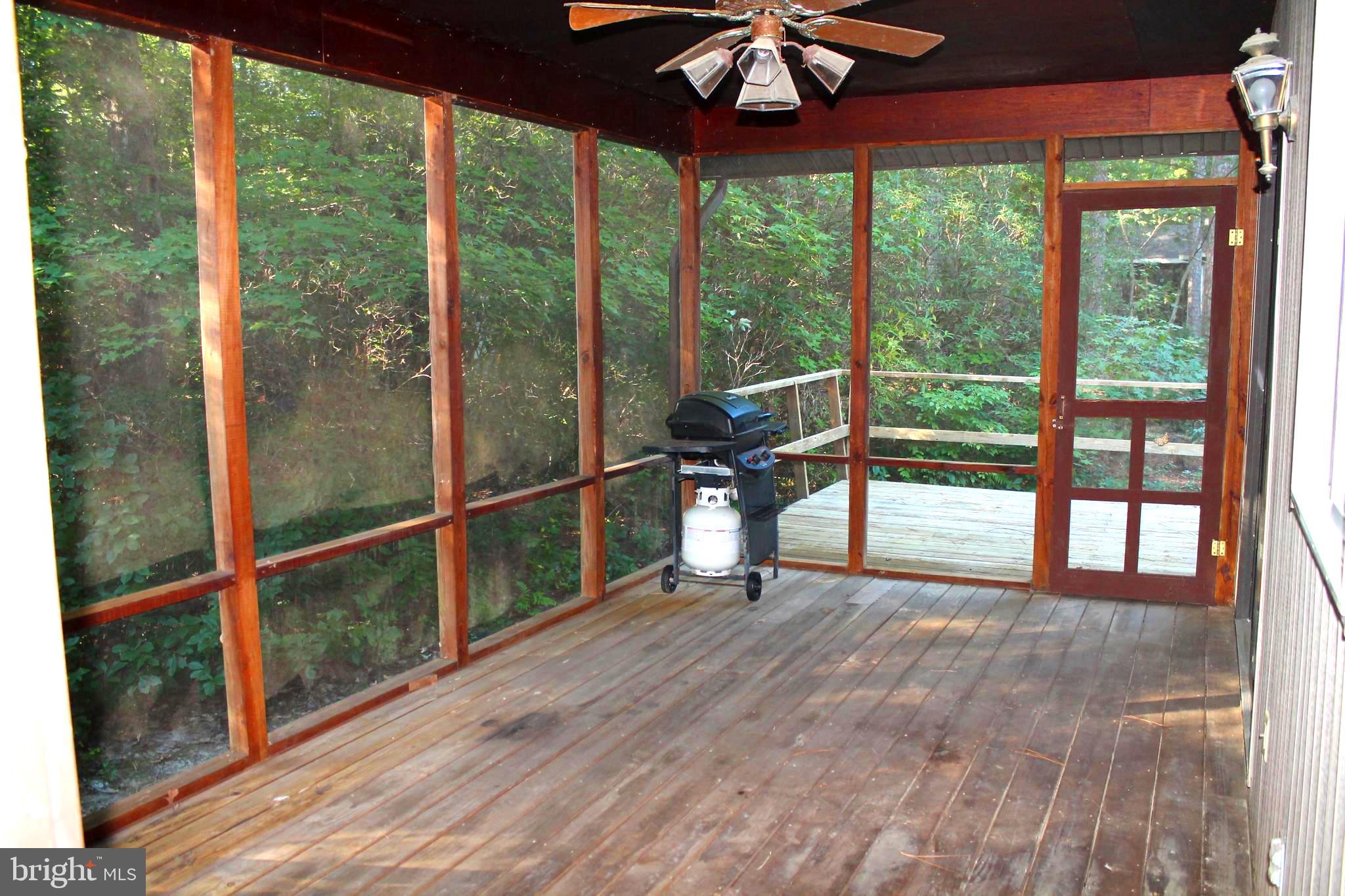 183 Sandyhook Road Ocean Pines, MD 21811 - Photo 4 of 15 a view of a room with a large window