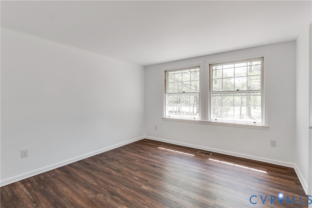 26 Liberty Tree Lane Hanover, VA 23069 - Photo 21 of 38 an empty room with wooden floor and windows