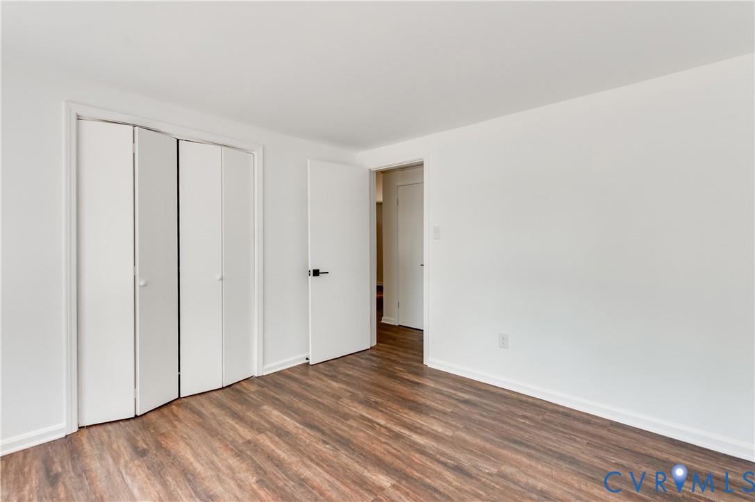 26 Liberty Tree Lane Hanover, VA 23069 - Photo 22 of 38 a view of an empty room with wooden floor