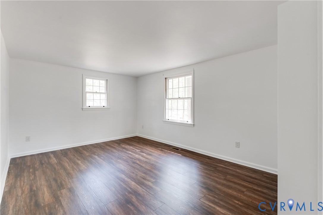26 Liberty Tree Lane Hanover, VA 23069 - Photo 26 of 38 an empty room with wooden floor and windows