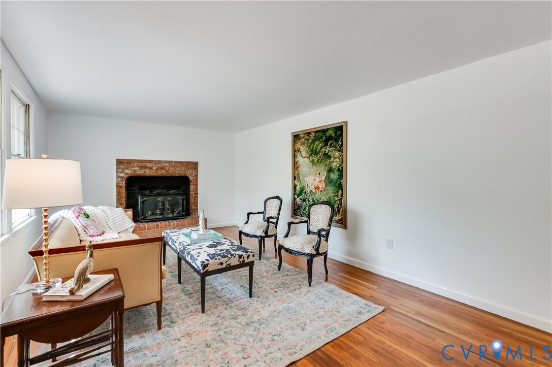 26 Liberty Tree Lane Hanover, VA 23069 - Photo 8 of 38 a living room with furniture and a fireplace