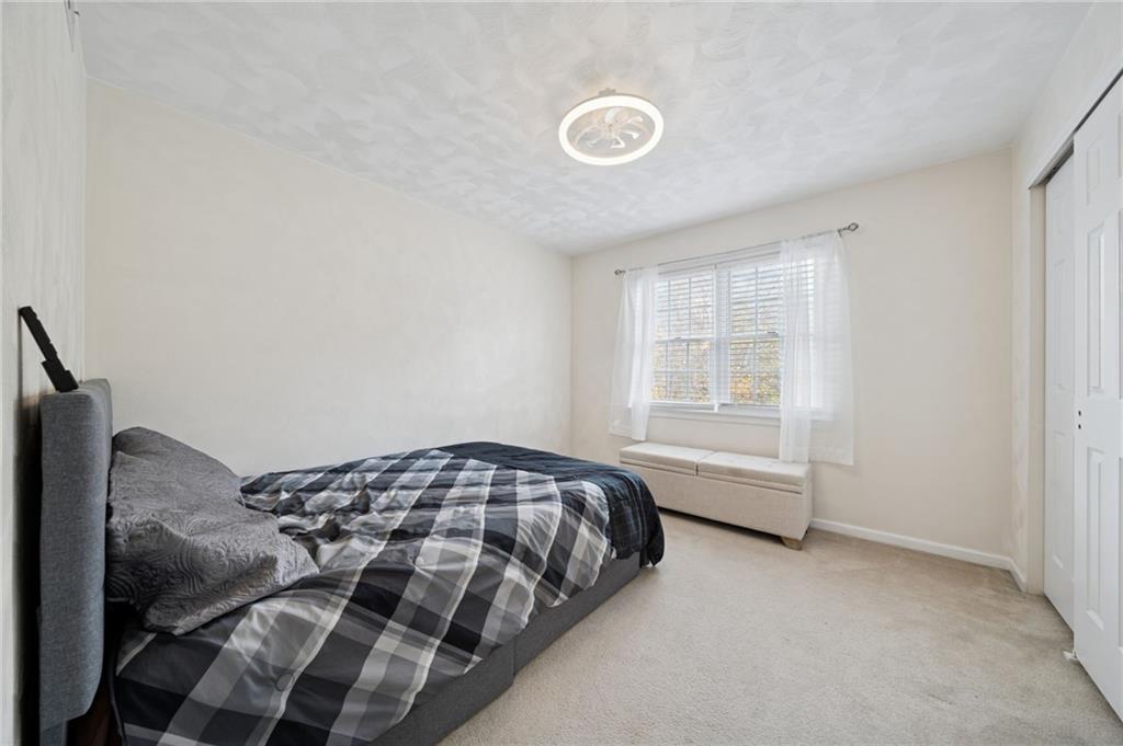 227 Sandworks Road Hunker, PA 15639 - Photo 28 of 41 a bedroom with a bed and window