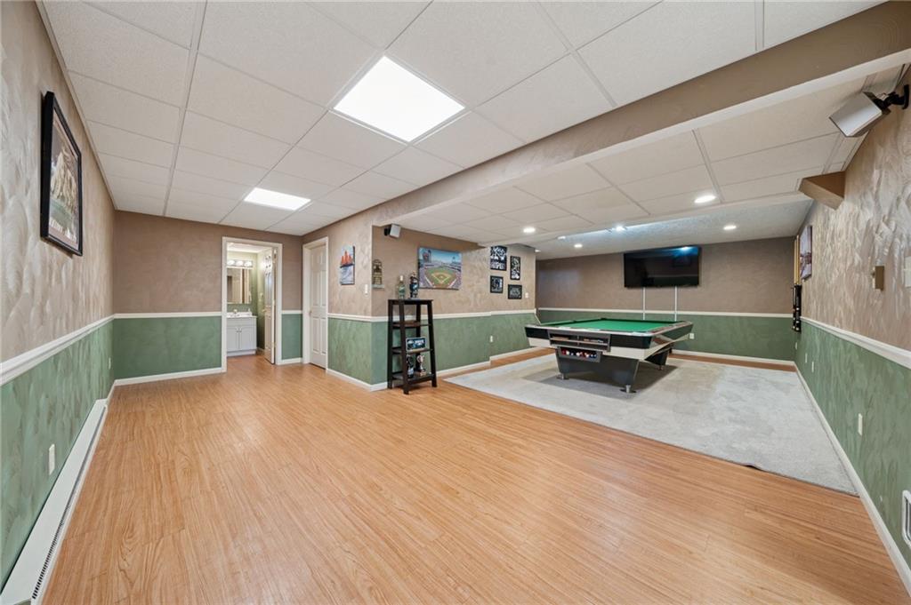 227 Sandworks Road Hunker, PA 15639 - Photo 30 of 41 a view of a livingroom with furniture and a flat screen tv