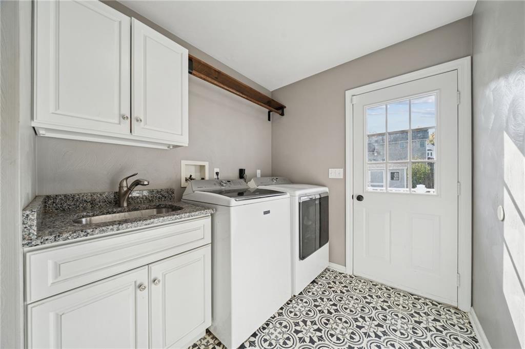 227 Sandworks Road Hunker, PA 15639 - Photo 4 of 41 a utility room with sink dryer and washer