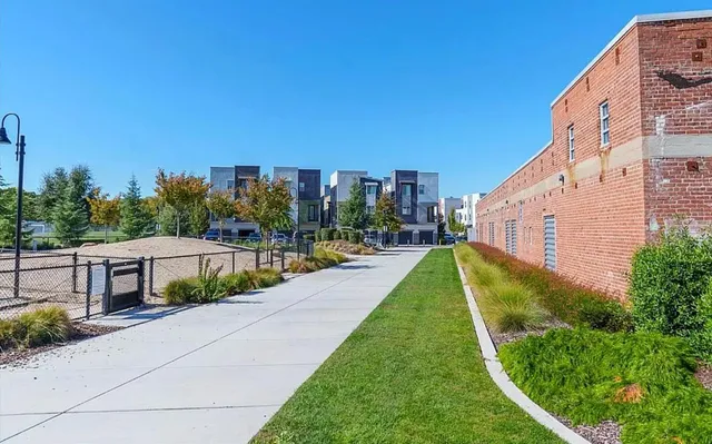 a view of a patio with a yard