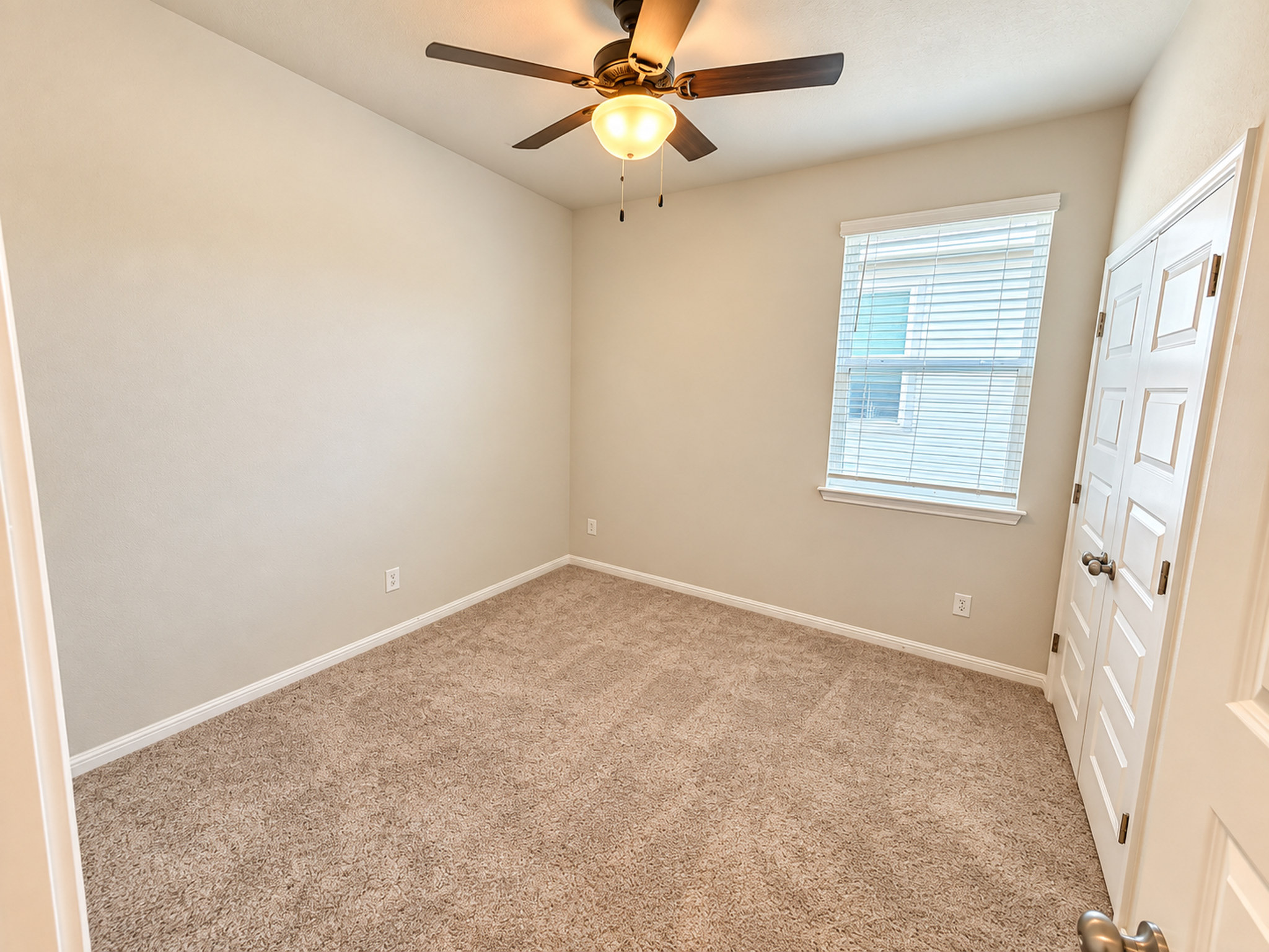 213 Escape Way Jarrell, TX 76537 - Photo 10 of 15 Soft carpeting pairs with neutral walls in this versatile bedroom spaces.