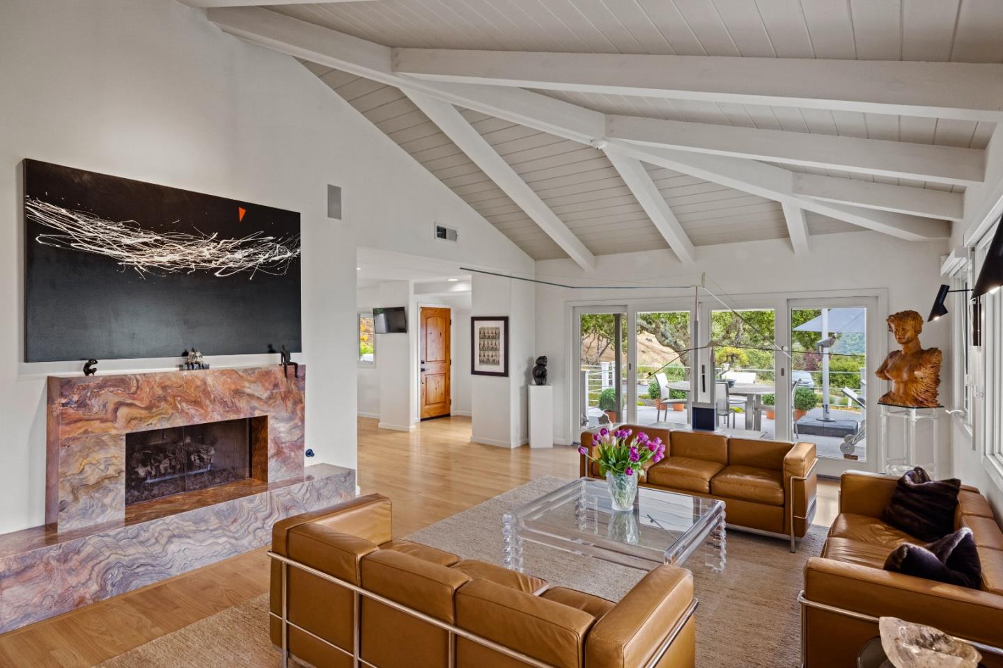 27 La Rancheria Carmel Valley, CA 93924 - Photo 12 of 30 a living room with furniture and a fireplace