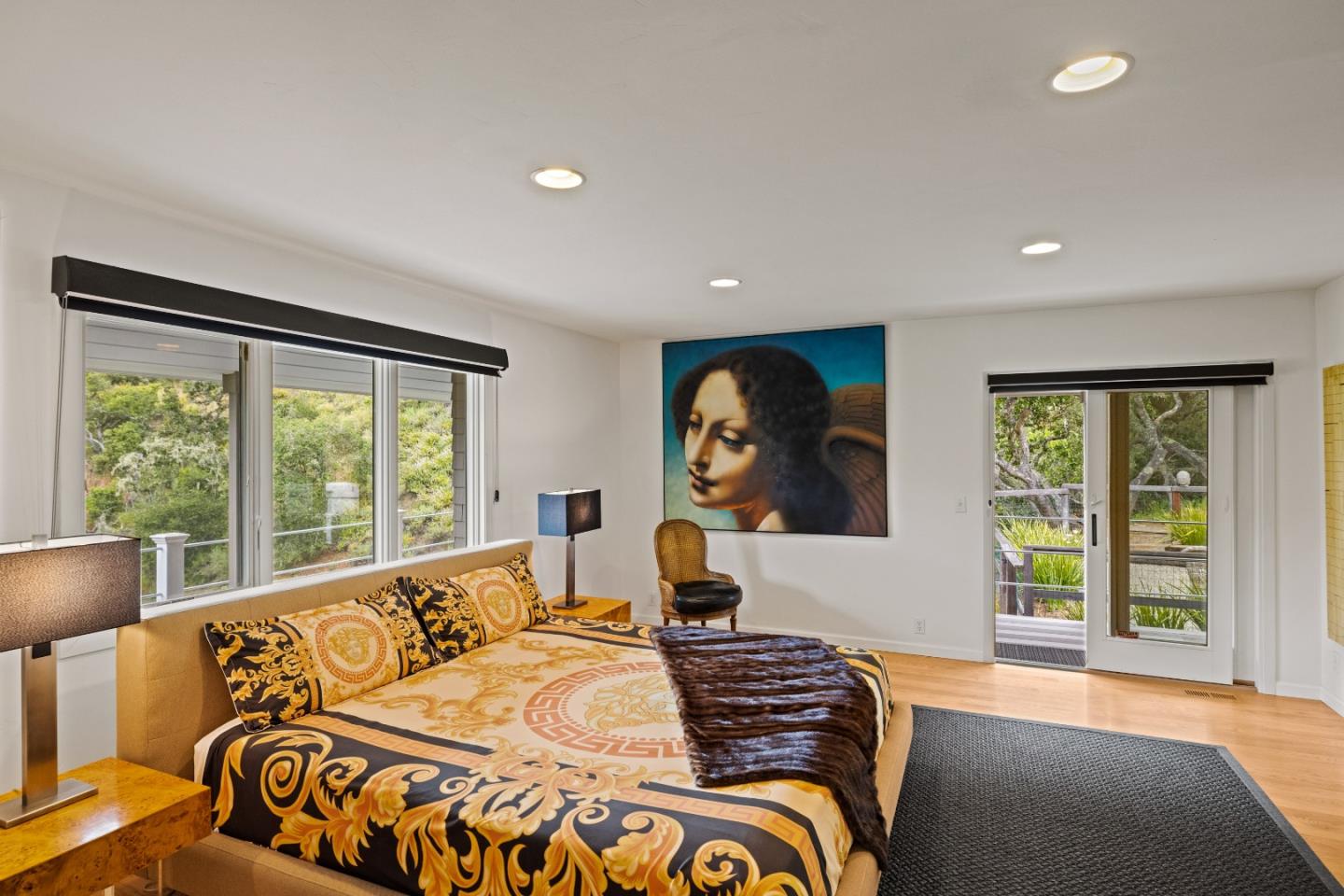 27 La Rancheria Carmel Valley, CA 93924 - Photo 14 of 30 a bedroom with a large bed and a large window