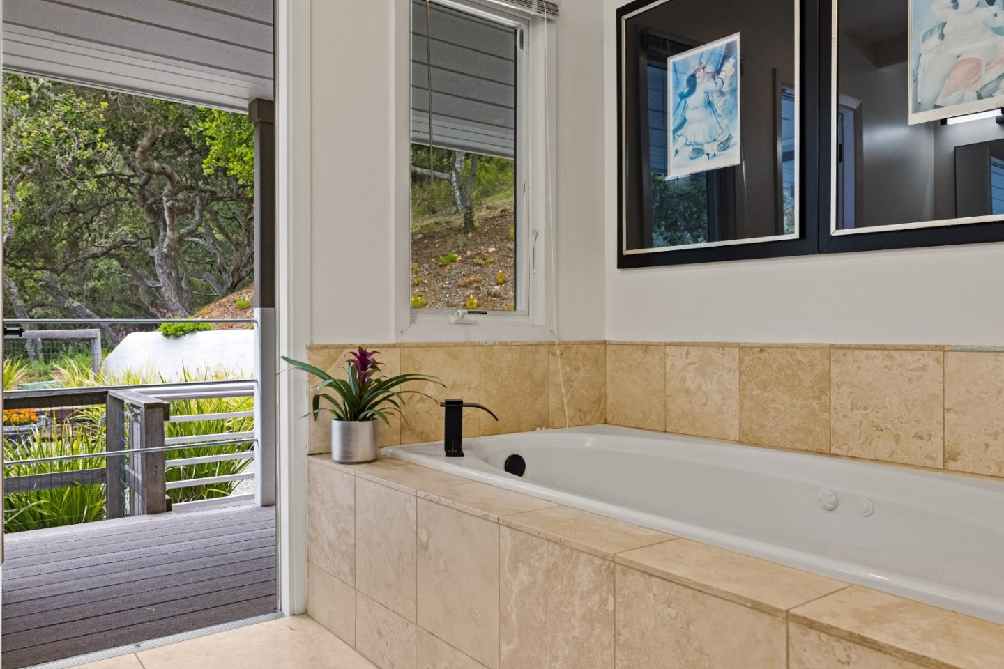 27 La Rancheria Carmel Valley, CA 93924 - Photo 16 of 30 a bathroom with a bathtub and a window