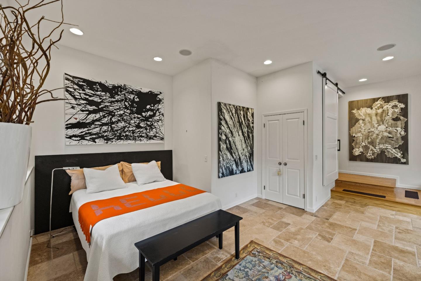 27 La Rancheria Carmel Valley, CA 93924 - Photo 19 of 30 a bed room with a bed and painting on the wall