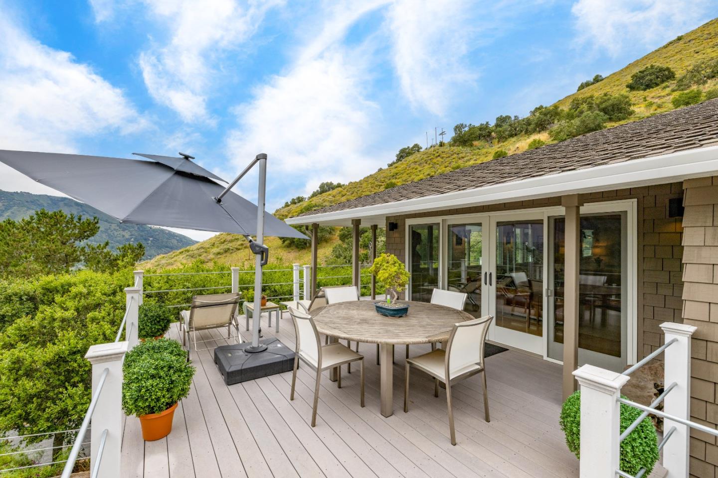 27 La Rancheria Carmel Valley, CA 93924 - Photo 25 of 30 a view of a table and chairs in patio of the house