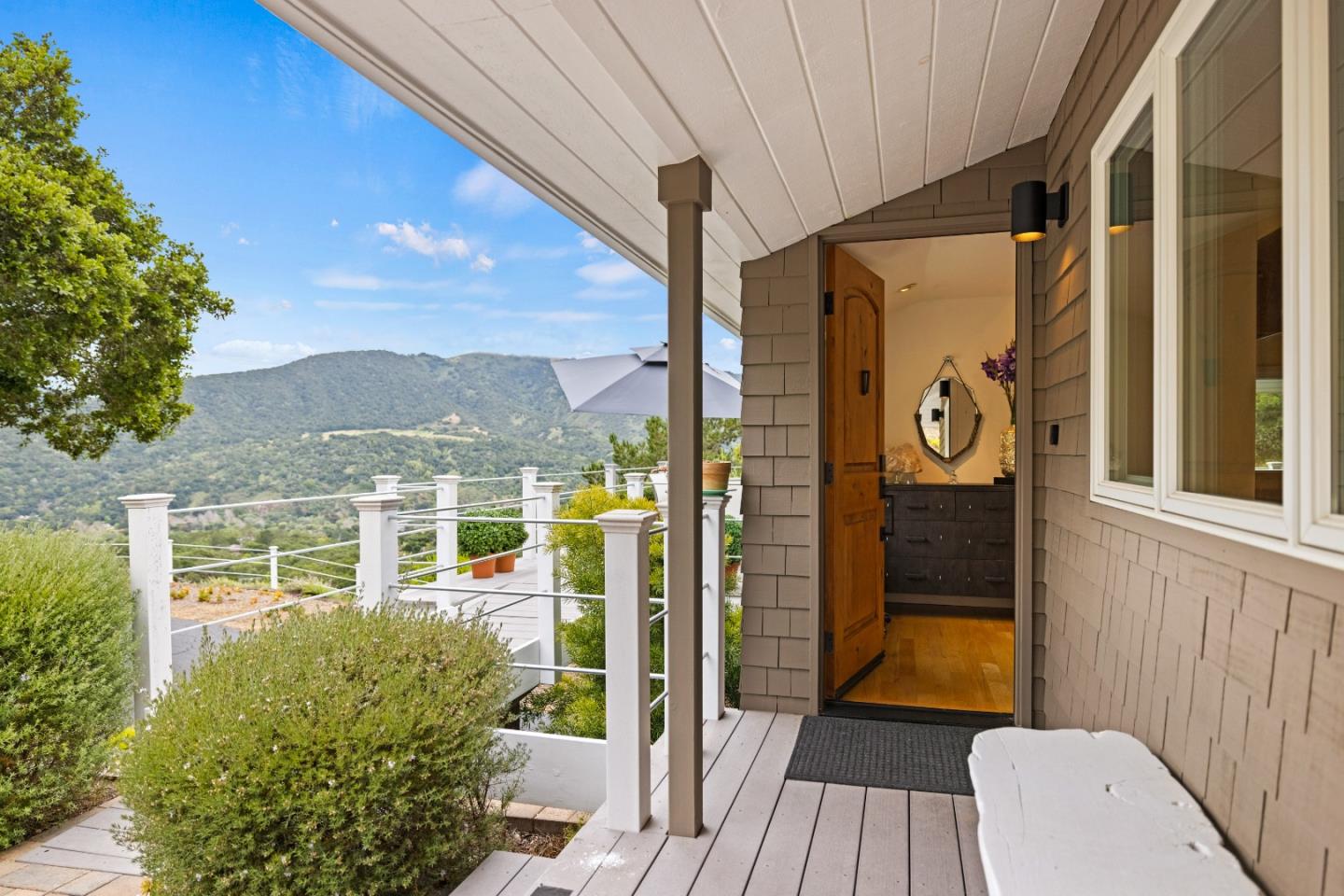 27 La Rancheria Carmel Valley, CA 93924 - Photo 3 of 30 a view of a house with a porch
