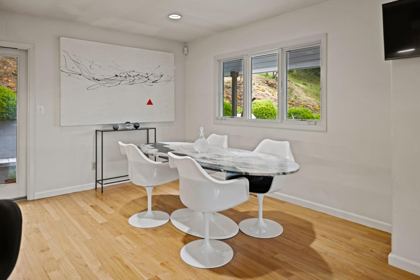 27 La Rancheria Carmel Valley, CA 93924 - Photo 5 of 30 a dining room with furniture and wooden floor