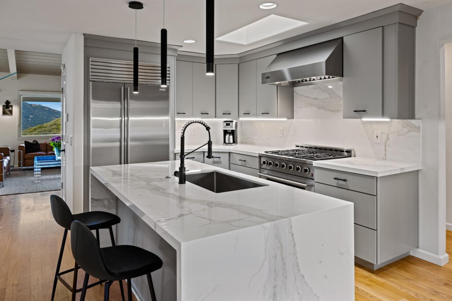27 La Rancheria Carmel Valley, CA 93924 - Photo 7 of 30 a kitchen with a stove a sink and a refrigerator