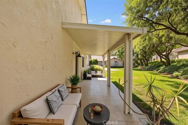 a view of swimming pool with patio