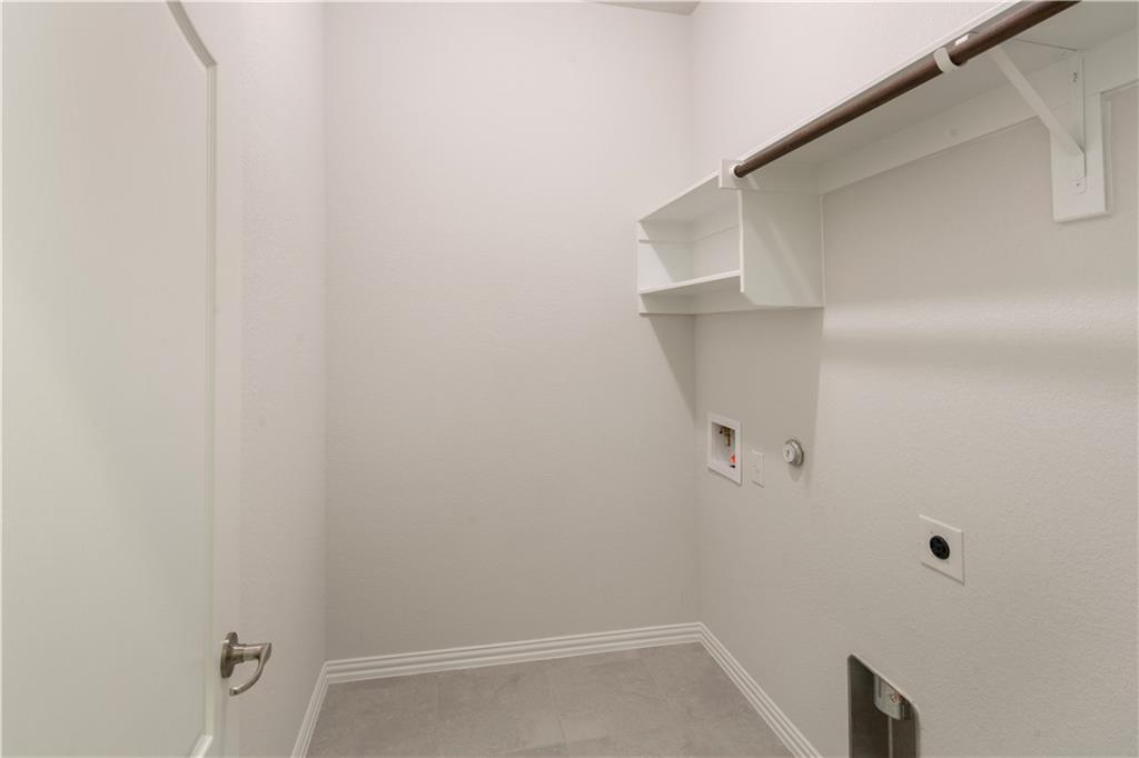 6752 Catania Loop Round Rock, TX 78665 - Photo 11 of 25 Laundry area with hookup for a gas dryer, hookup for a washing machine, and hookup for an electric dryer
