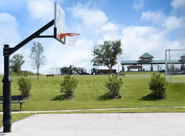 6752 Catania Loop Round Rock, TX 78665 - Photo 17 of 25 View of sport court featuring a lawn and community basketball court