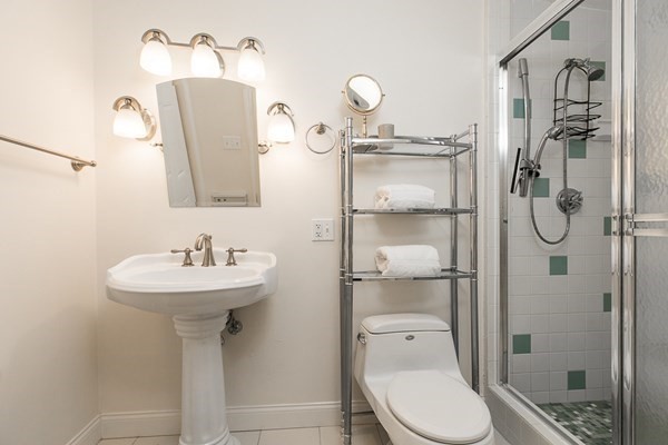 23 Wyoma Road Gloucester, MA 01930 - Photo 11 of 22 a bathroom with a sink toilet and shower